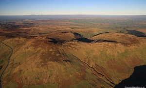 looking up Breast High Road and showing Greesnide Crag  from the air