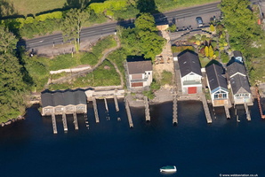 boathouses along Windermere lakeshore in the Lake District from the air