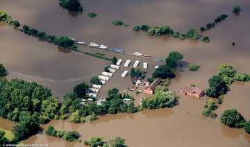 Coalhouse Inn &  Severnside caravan site & boat park Apperley  during the great River Severn floods of 2007 from the air
