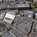  old Market Buildings and Multi story car park in Blackburn from the air  