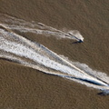 waterboard towed by jet ski  from the air