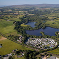 Scorton Lake Lancashire  showing Six Arches Country Park and Country Holiday Parks Caravan site in the foreground from the air