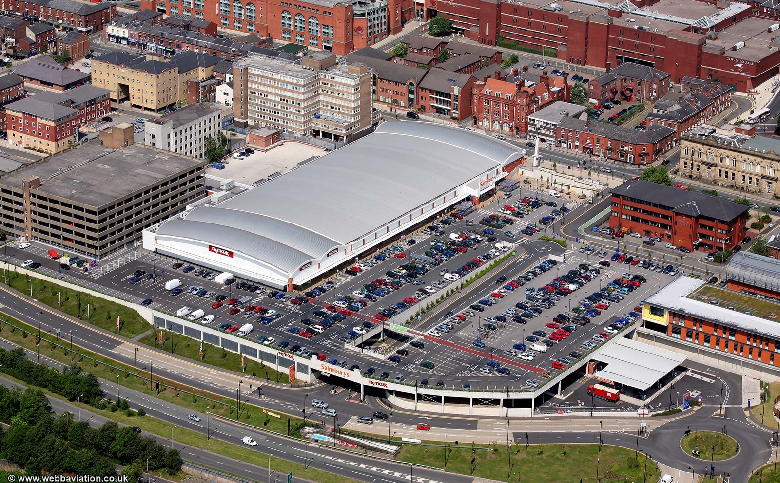Sainsbury's and TK Maxx in  Oldham town centre   from the air