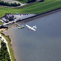 Cessna 172 flying over Cowm Reservoir from the air
