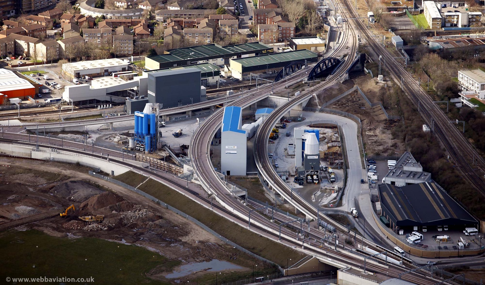 Tarmac Concrete Plant in  London  completly surrounded by railway lines  from the air