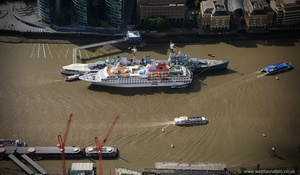 MS Hanseatic cuise ship moored next to HMS Belfast in London  from the air
