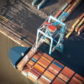 container crane unloading the container ship at the Liverpool aerial photograph