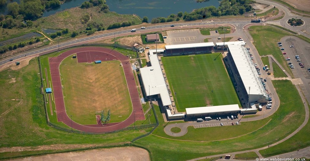 Sixfields Stadium and  athletics running track Northampton  from the air