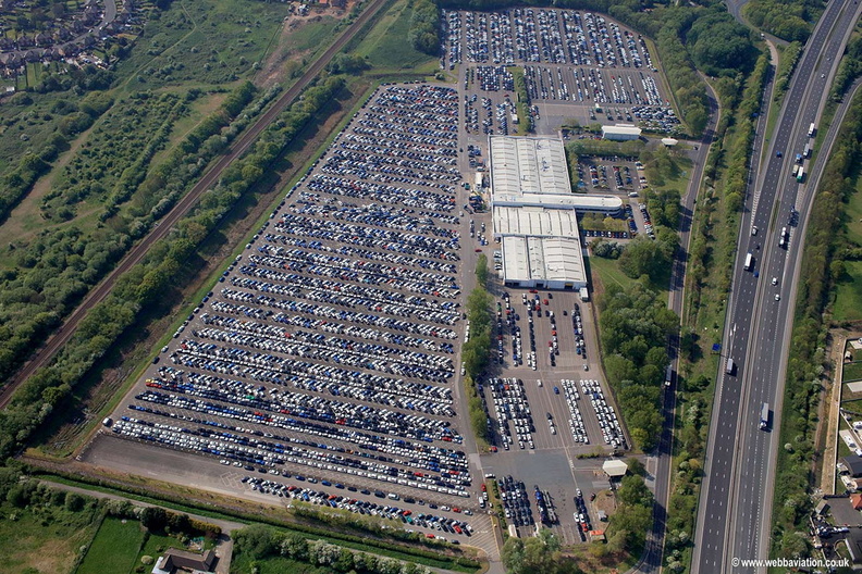  newly arrived BMW cars awaiting pre delivery inspection at BMW Thorne Distribution centre    aerial photograph