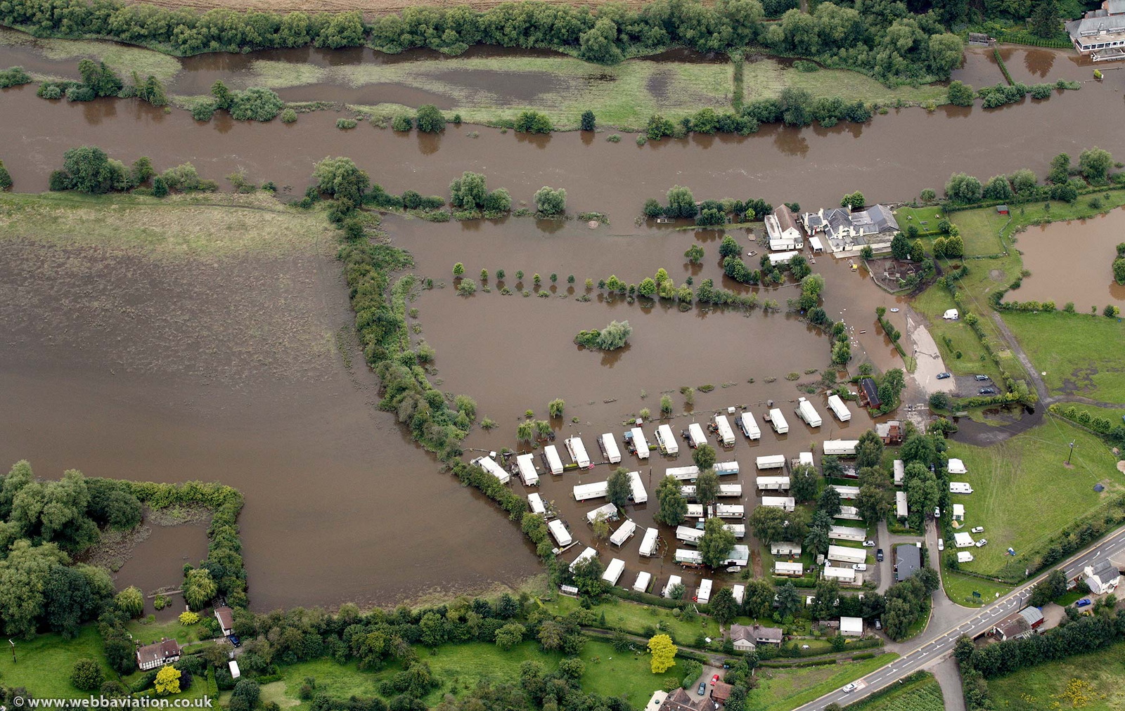 flooded Holt Fleet Caravan site  during the great River Severn floods of 2007 from the air