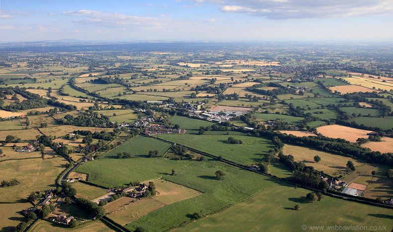  Cheshire plain with the Village of Hampton Heath in the foreground  from the air
