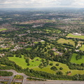 Cheadle with  Bruntwood Hall and Bruntwood Park in the foreground  from the air