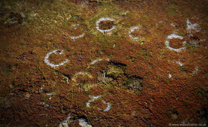 hut circles at Garn Boduan  Iron Age hillfort  from the air 